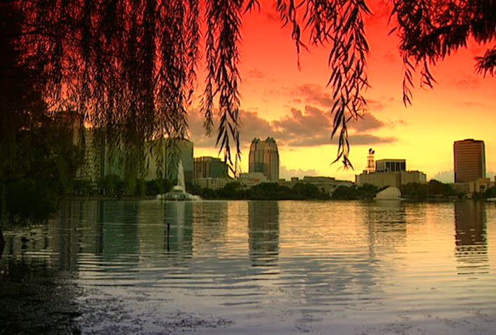ORLANDO - Circa 2002: Sunset on Lake Eola and the Orlando skyline in 2002.