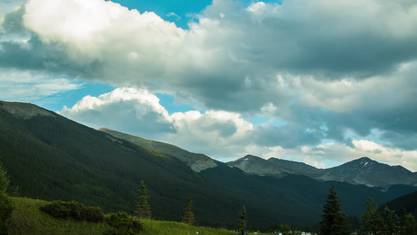 dark clouds cover Rocky Mountains in Colorado long exposure time lapse