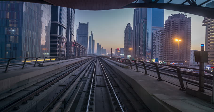 Time lapse journey on the modern driverless Dubai elevated Rail Metro System, running alongside the Sheikh Zayed Road Royalty-Free Stock Footage #24518795