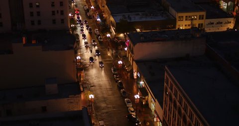 SAN DIEGO, CA - Circa February, 2017 - An aerial evening long shot view of traffic passing on 5th Avenue in San Diego's Gaslamp Quarter.	 	