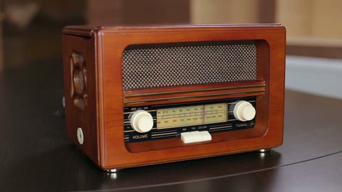 Vintage Radio on wooden table is in the vintage room.