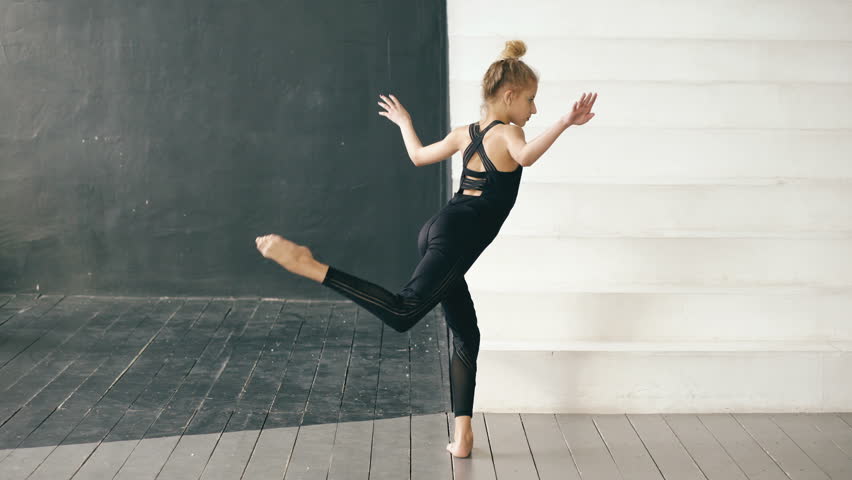 Modern beautiful teenage girl dancer perfomance contemporary dance in ballroom indoors | Shutterstock HD Video #24523178