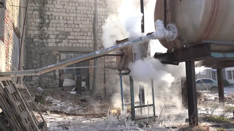 Hot Steam Flies Out Leaky Tank Stock Footage Video (100% Royalty-free