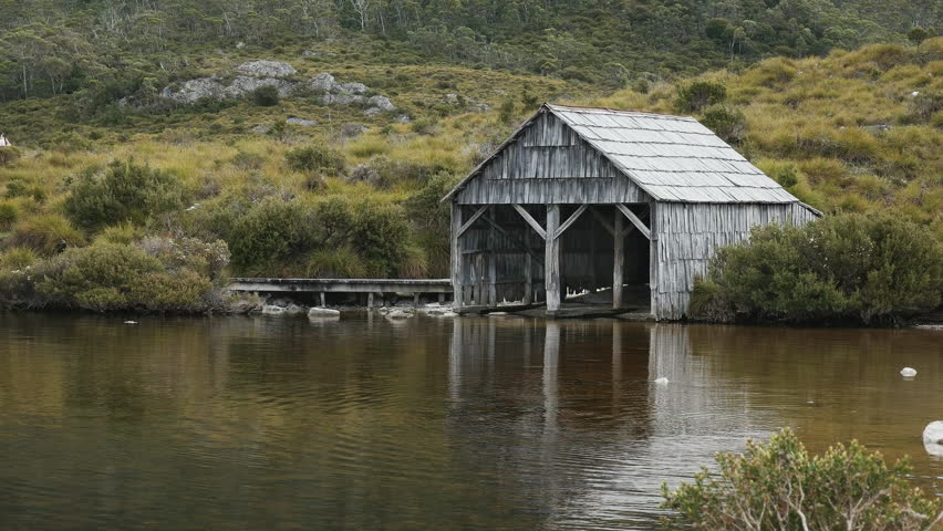 afternoon summer shot of the historic boat shed at dove lake in tasmania, australia
