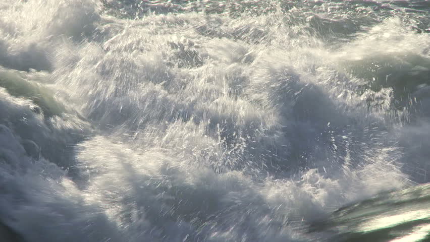 Large and turbulent waves on a river in flood conditions