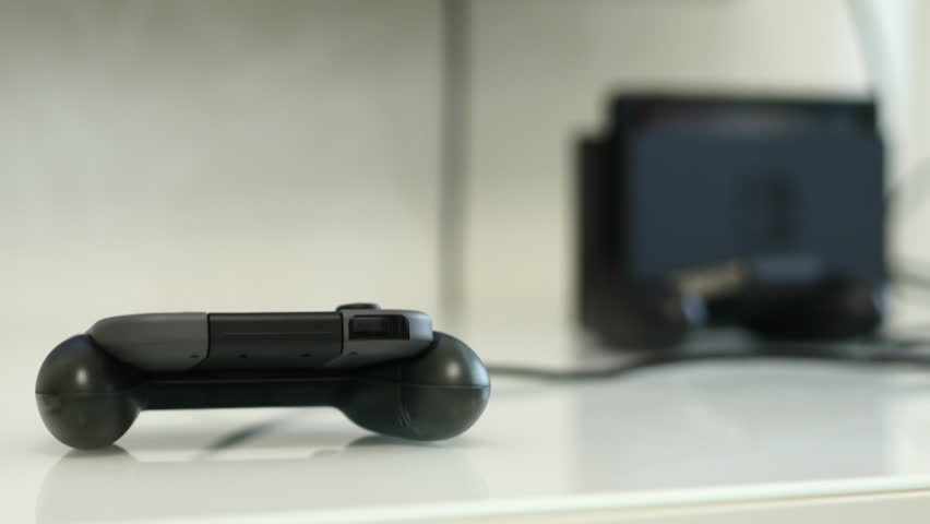 Gamepads On A White Table