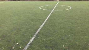 Synthetic surface of football sport background 4K 2160p 30fps UltraHD footage - Artificial green grass and markings of soccer terrain 3840X2160 UHD video