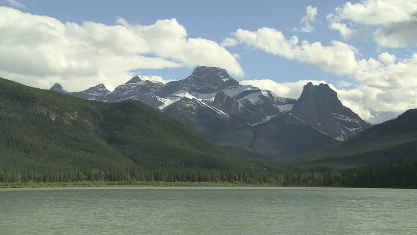 Cloud time lapse over the Mount Lougheed mountain group and Gap Lake in the Canadian Rockies