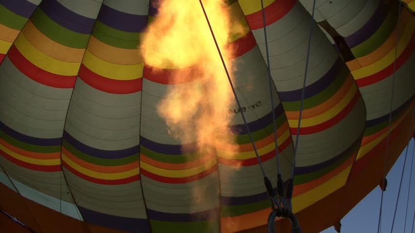 A Hot Air Balloon flame is used in Kenya, Africa. 