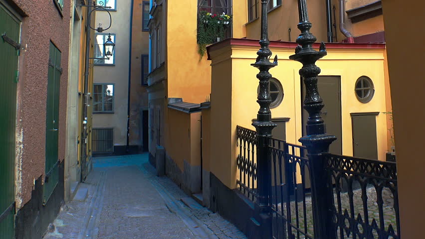 Ancient narrow street in central Stockholm. Old town. Architecture, old houses, streets and neighborhoods. Sweden.