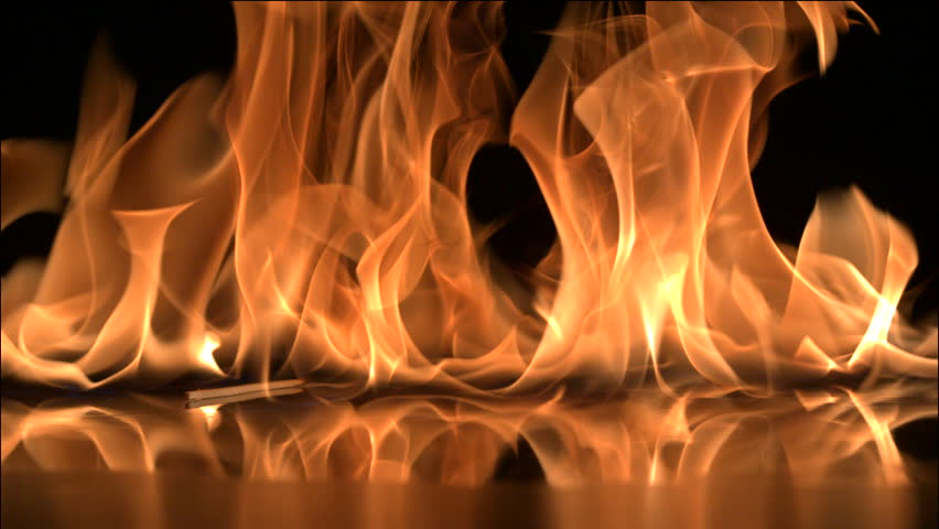 Falling matchstick lights a flammable liquid | Shutterstock HD Video #2458931