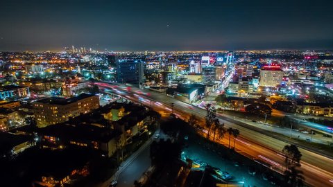 4K Aerolapse ( aerial timelapse / hyperlapse ) view of 101 Hollywood freeway and Vine street in Hollywood area in Los Angelest at night.