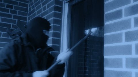 Burglar at work with a crowbar at night and go in multi angle 11865 
