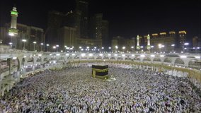 Time lapse video of Muslim pilgrims circling around the holy Kaaba at night during Hajj inside al Masjid al Haram in Mecca, Saudi Arabia.