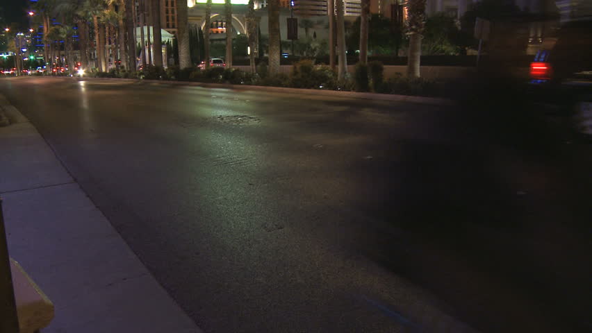 LAS VEGAS - MARCH 1: Motorbike passing by on the Las Vegas strip at nightime on