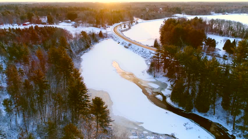 Wisconsin’s beautiful northern wilderness. Daybreak after blizzard snowfall, aerial view.