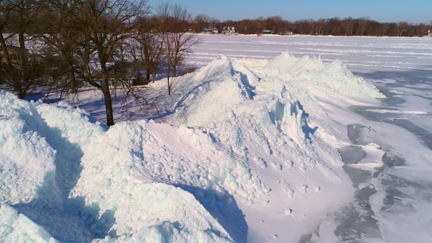 Lake Winnebago, WI, Ice shoves build small mountains of ice along the shoreline; sometimes destructive, they are driven by winds that grip the surface ice and jamb it into the opposite shore.