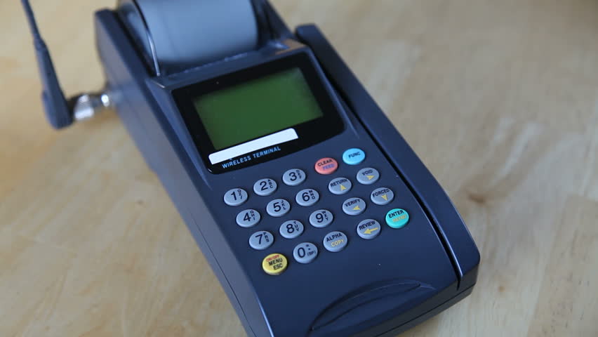black and white wireless credit card terminal