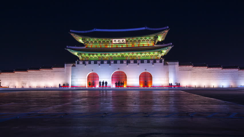 Gyeongbokgung Palace at night and traffic in seoul city, south korea, 4K Timelapse.