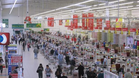 SAMARA - MAY 5: (Timelapse View) Customers buy products at checkout in Auchan, on May 5, 2012 in Samara, Russia. There are 50 Auchan superstores in Russia, with 12 added in the last 2 years alone. 