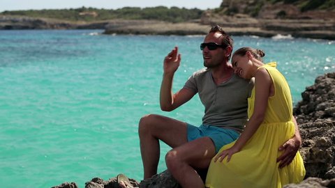 Couple Love Sitting On Rocks By Stock Footage Video (100% Royalty-free ...