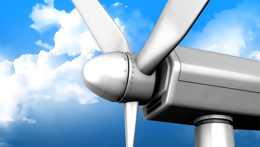Windturbine fan close up with blue sky as background.