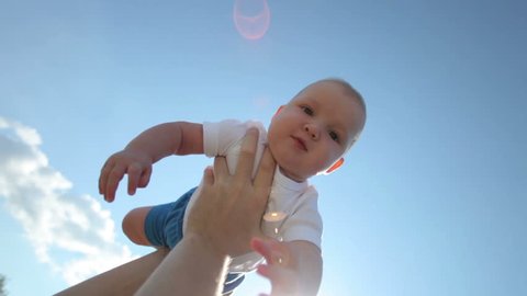 Flying newborn baby boy
 Stock Video