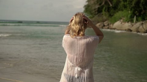 251 Beach Undress Stock Video Footage - 4K and HD Video Clips