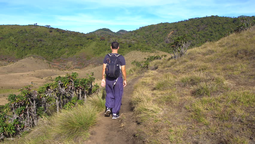 Adventure Travel. Male Traveler at Horton Plains National Park