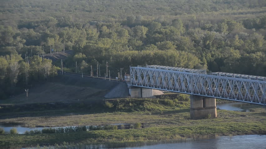 Railway bridge, train. Ufa, the Belaya River, Russia. 