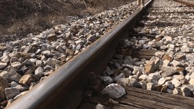 Female on abandoned railroad 4K 2160p 30ffps UltraHD footage - Daily scene with woman walking on rails 3840X2160 UHD video