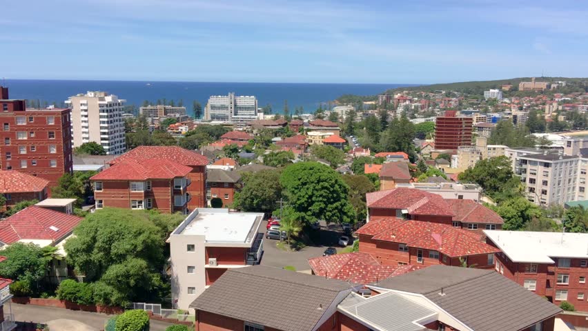 Sydney, Manly Beach buildings and coastline.