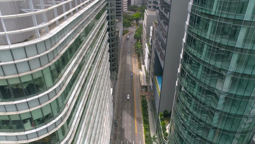 Singapore downtown streets Aerial footage through the skyscrapers