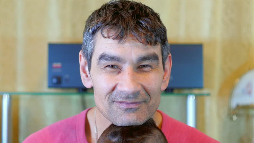 Father and son looking into the camera