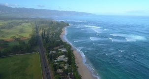 Aerial video beachfront homes in Hawaii Oahu 4k 24p
