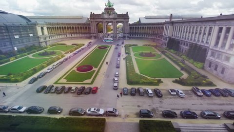 Brussels city park from above, Belgium capital famous monument with horses aerial, European city air shot with tourist buses, travel sight seeing place, arches and columns, historical architecture

