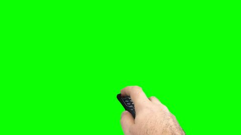 
A men's hand uses a remote control on green screen 