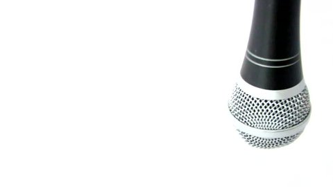 Microphone Swinging Falling and Dropped Isolated on White