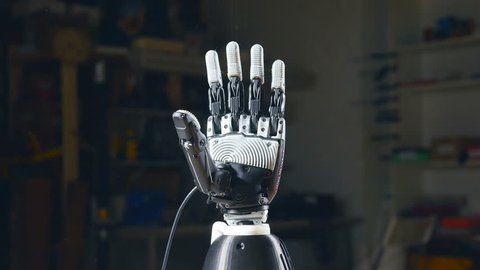 Bionic arm printed on 3D printer. Futuristic technology.