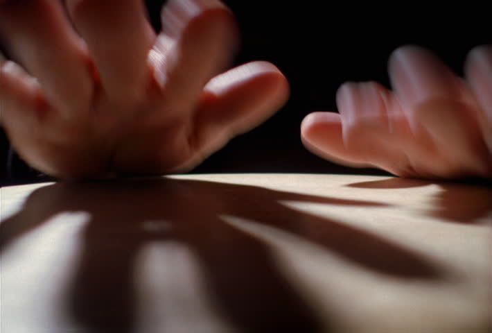 Close-up of conga drum being played