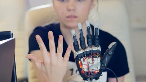 Human arm with robot arm. Futuristic robotic cyber technolgy roday.