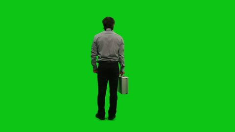 Businessman with a briefcase. Green Screen.

