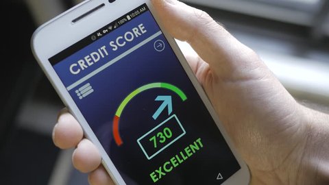 Credit score app on smartphone showing a good credit history result to the user.