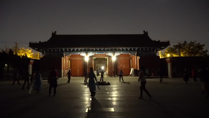 People dance in the square. 50fps. Night in China.
