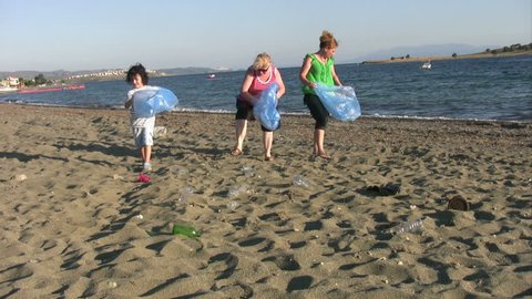 Cleaning up litter on the beach