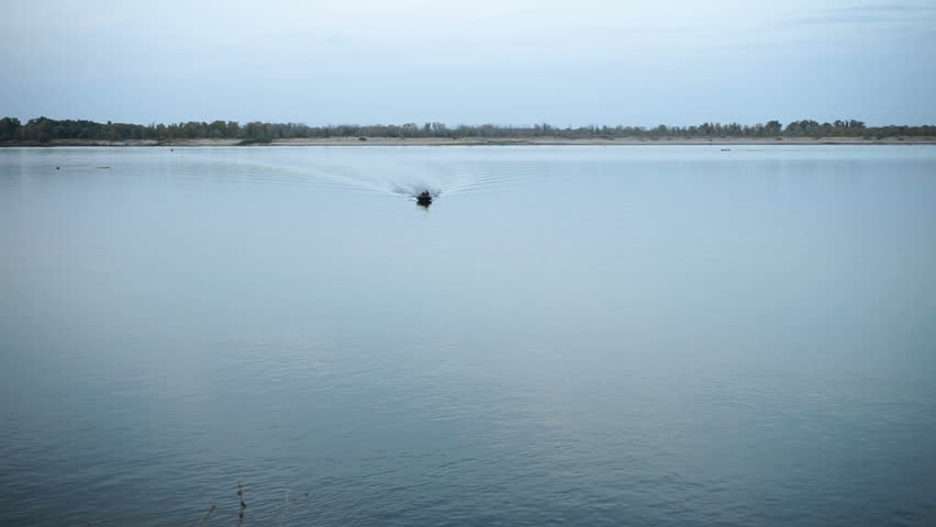 Two motor boats floating on the longest river in Europe called Volga. Russia. HD, a Nature Video by ActionStore