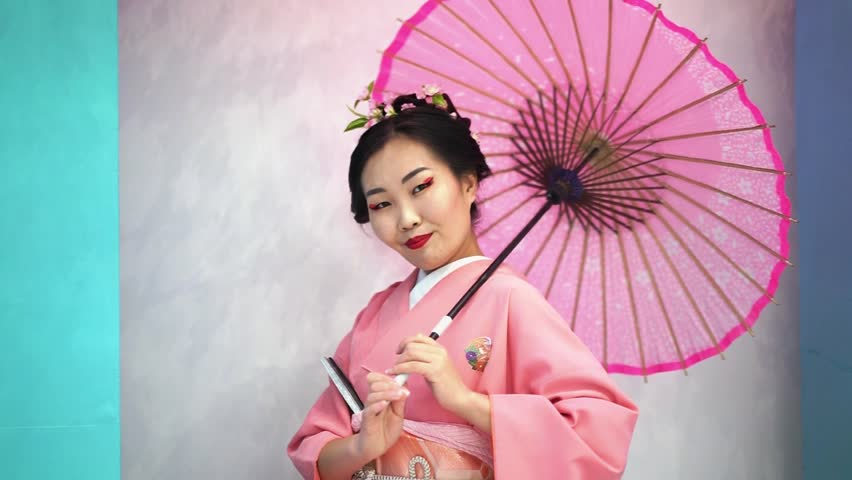 geisha with umbrella