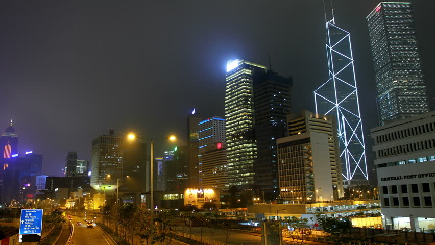 Street and building of Hong Kong city at night, timelapse