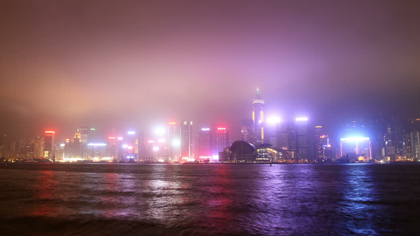 Hong Kong city sky line at night from Victoria harbour view, timelapse
