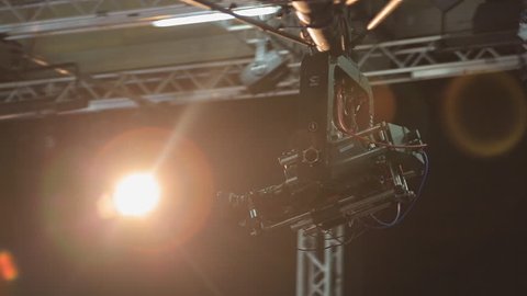 The camera on the crane moves in the pavilion during shooting